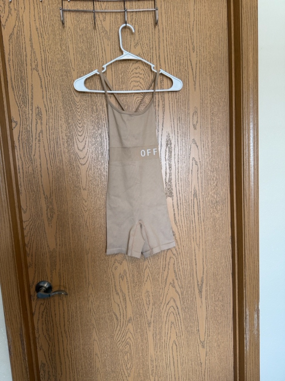 Beige Ribbed Sleeveless Jumpsuit with 'OFF' Detail